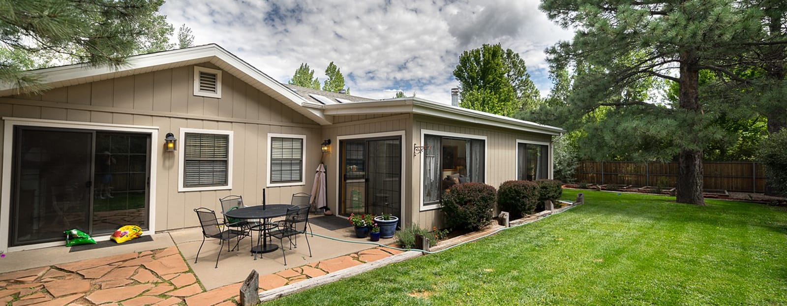 house backyard patio and lawn
