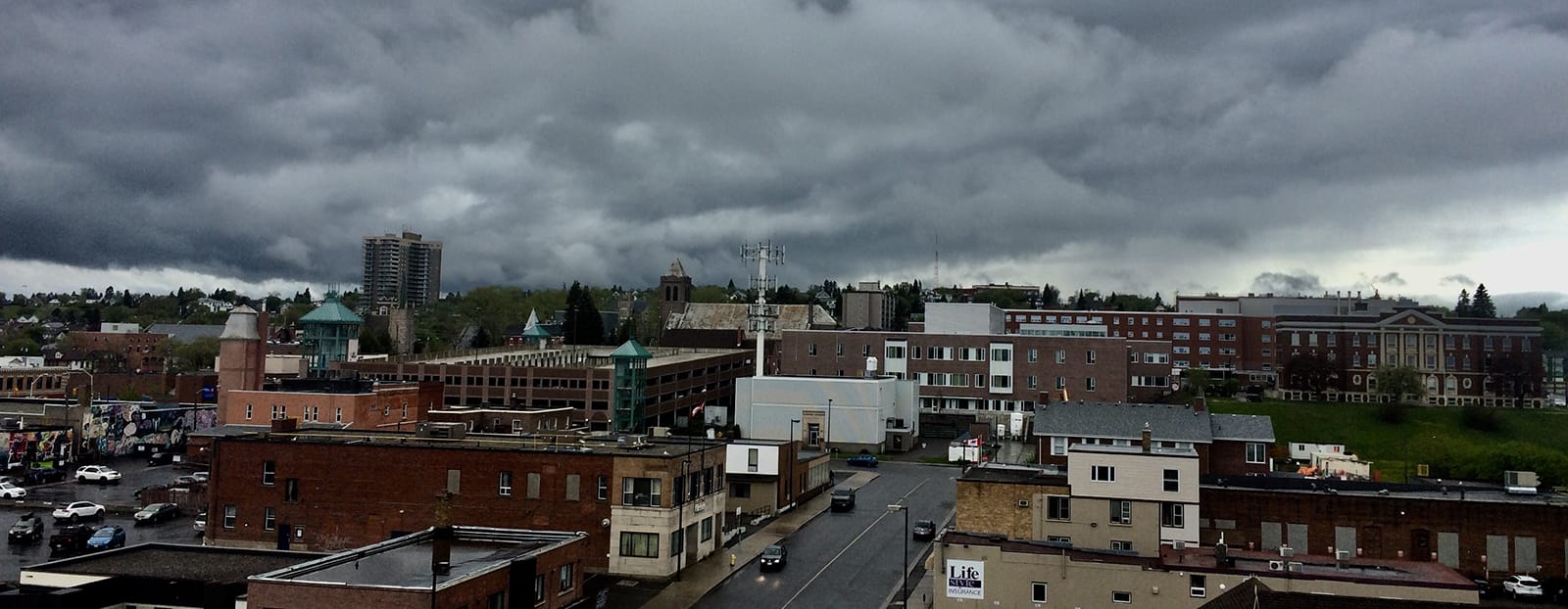 dark clouds over city