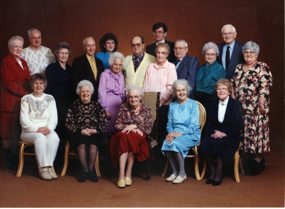 group of elderly people posed for photo
