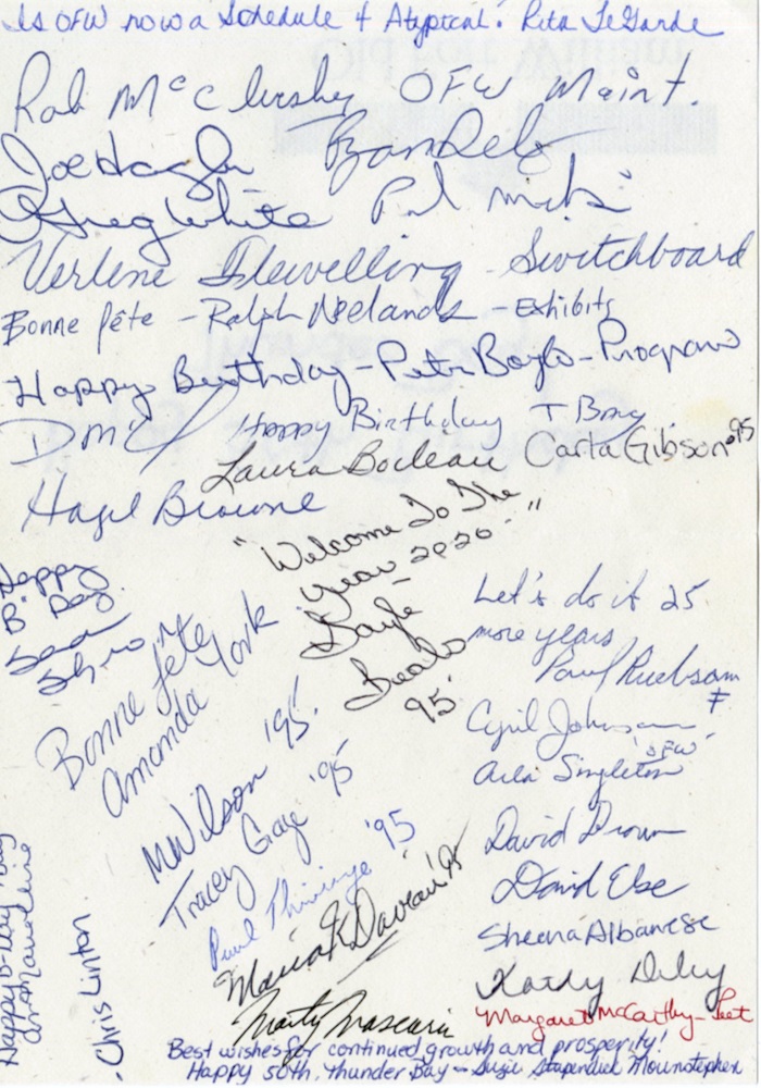 back of card with many signatures