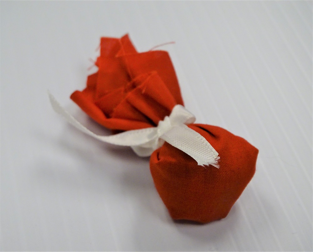 Small leather satchle with maise bead flint sage inside