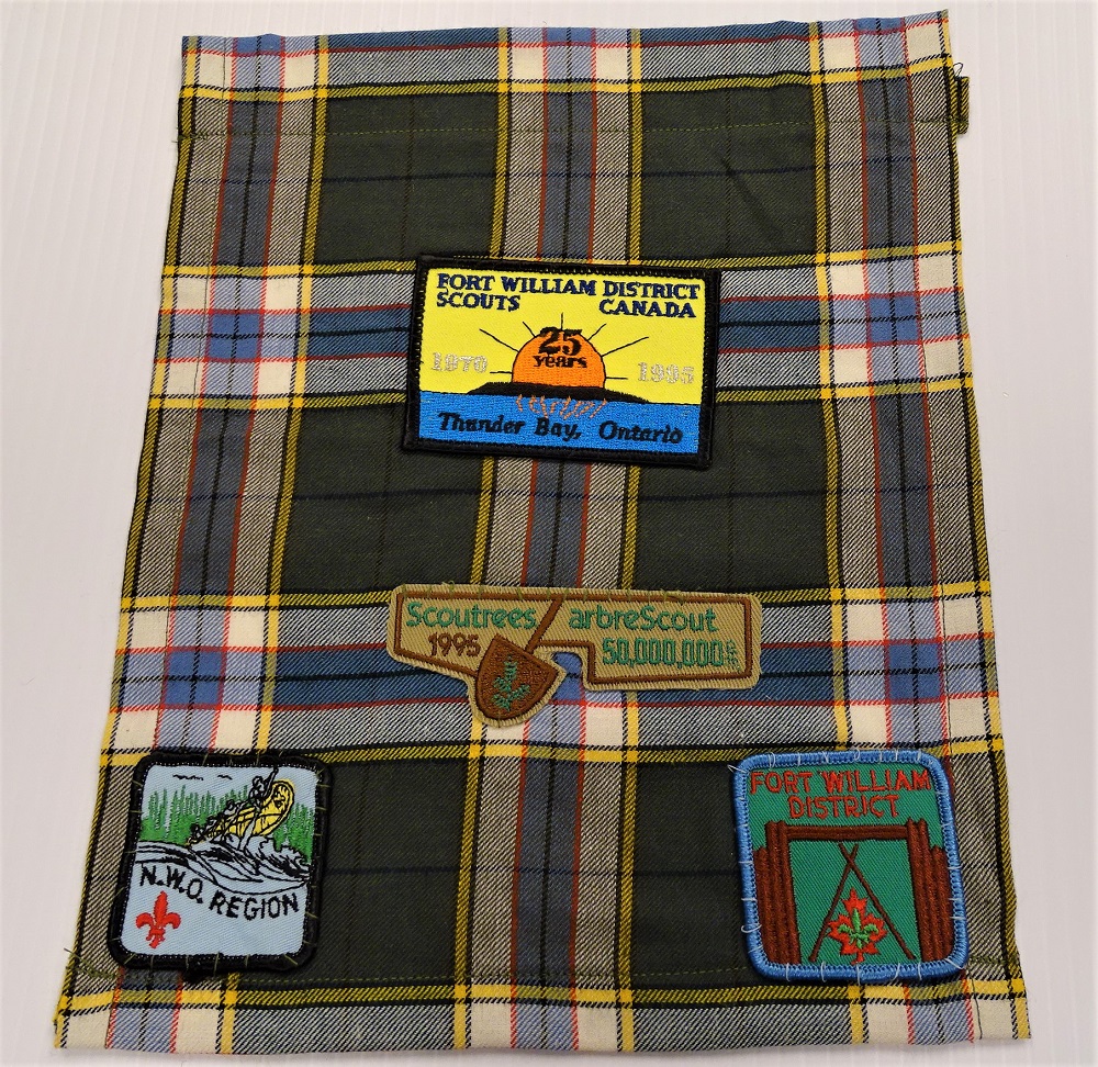 Tartan with patches from Fort William District Scouts Canada