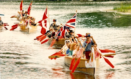 Dignitaries canoing at Fort William Historical Park in 1987