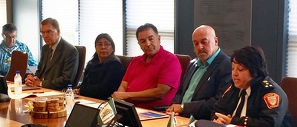 North Caribou Lake Friendship Agreement Signing with several people sitting at table