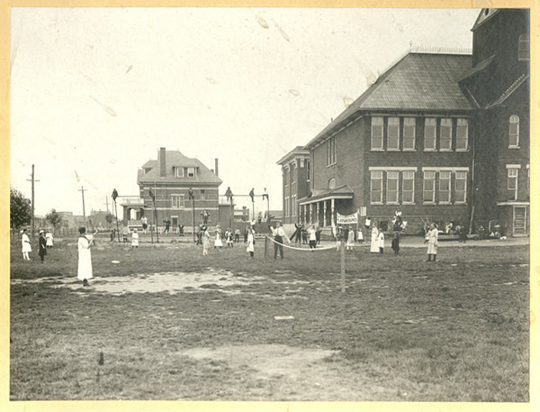 Children playing various games in playground with a banner titled "Collegiate Playground" 