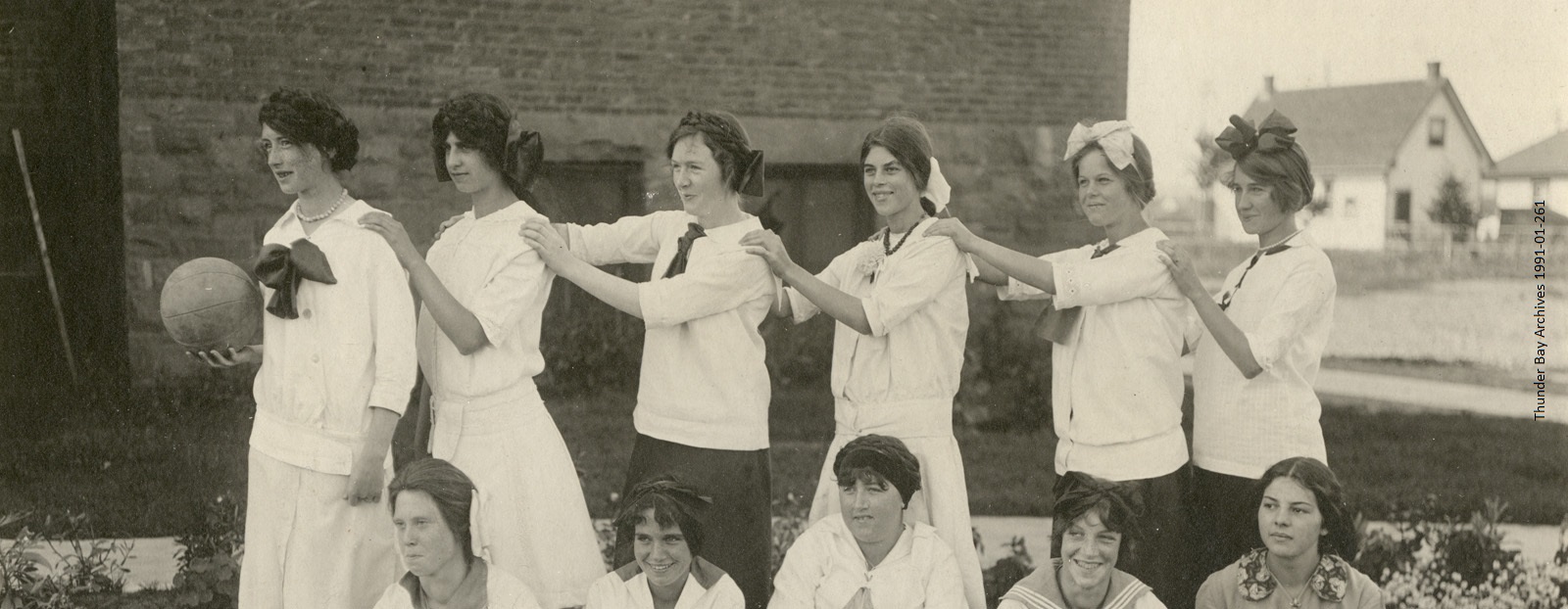 Historic photo of woman playing ball