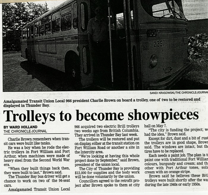 A newspaper article with a photo of a man standing in the door of a trolley 