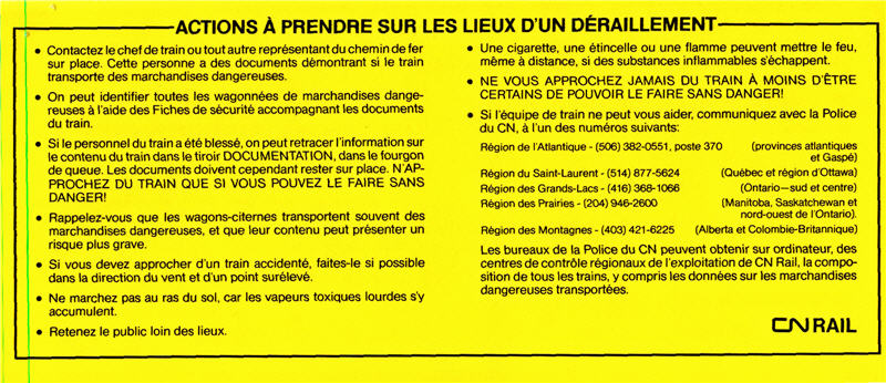 A bright yellow warning label produced by the Canadian Railway 