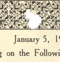A cut out section from the top of the ballot with a hole punched in it