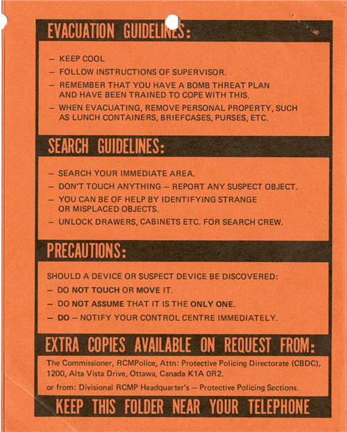 An orange pamphlet detailing what to do in case of a bomb threat