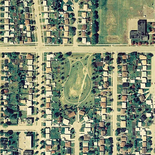 An aerial view of the parkland and surrounding residental area