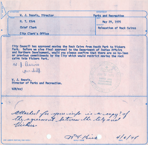 A pink piece of paper with blue lettering 