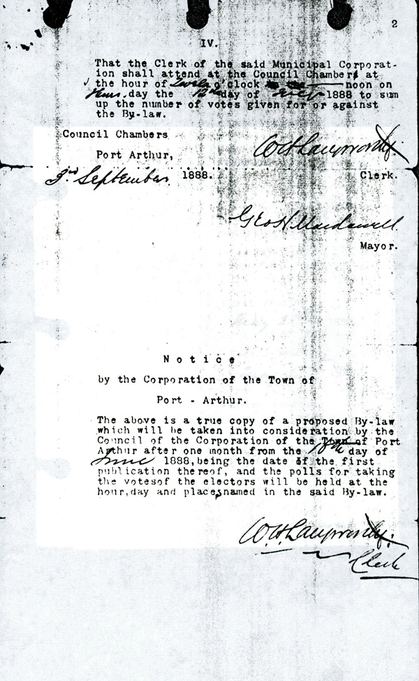 A copy of a document in a notebook faded from age 
