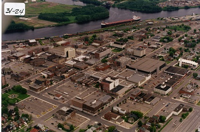 An aerial photograph taken above Fort William showing the Kam River and houses