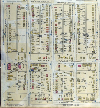 A street map depicting houses and roads drawn in colour