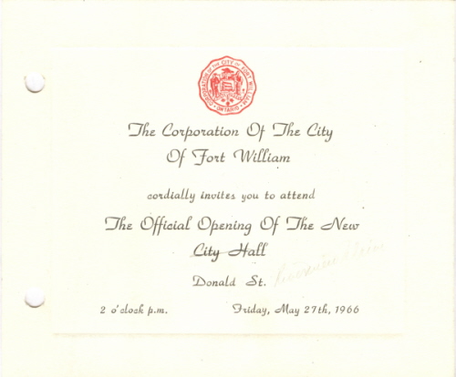 An invitation handwritten in cursive with a red seal on top