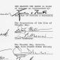 A cut out page of signatures on a typed document 