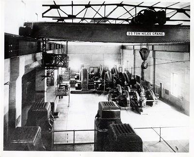 inside of the Kam Power Company with steam and parts