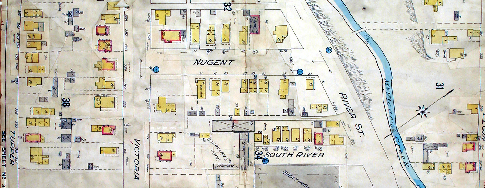 A cut out section of a map showing housing lots and streets 