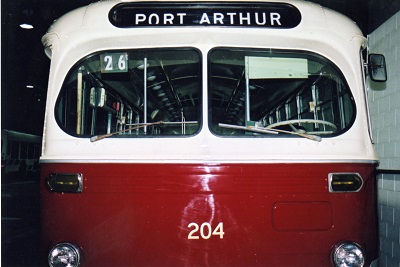 a red and white Port Arthur trolley 