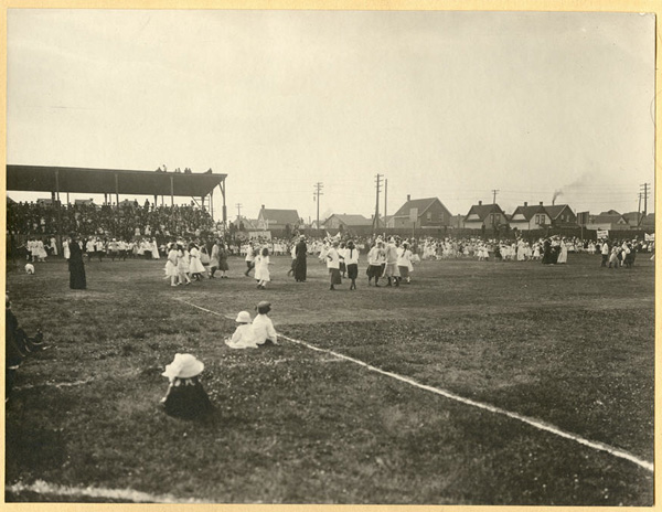 Children preparing for a flag drill at McKellar Park, as part of the Playfest celebration. 