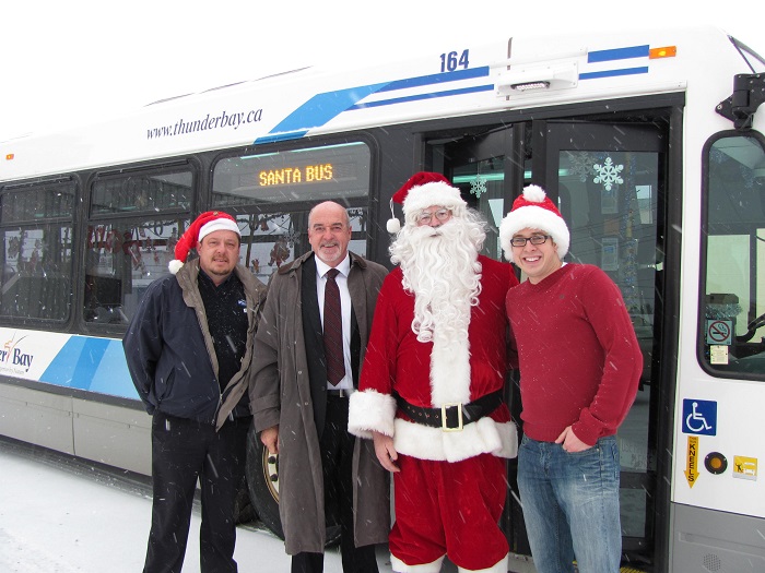 Santa and his two helpers with mayor Keith Hobbs