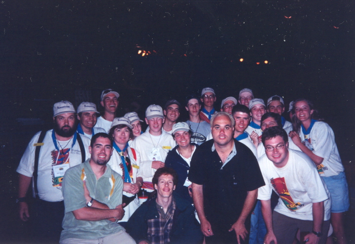 scouts and leaders with members of a band 