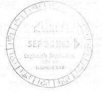A round seal that is faded 