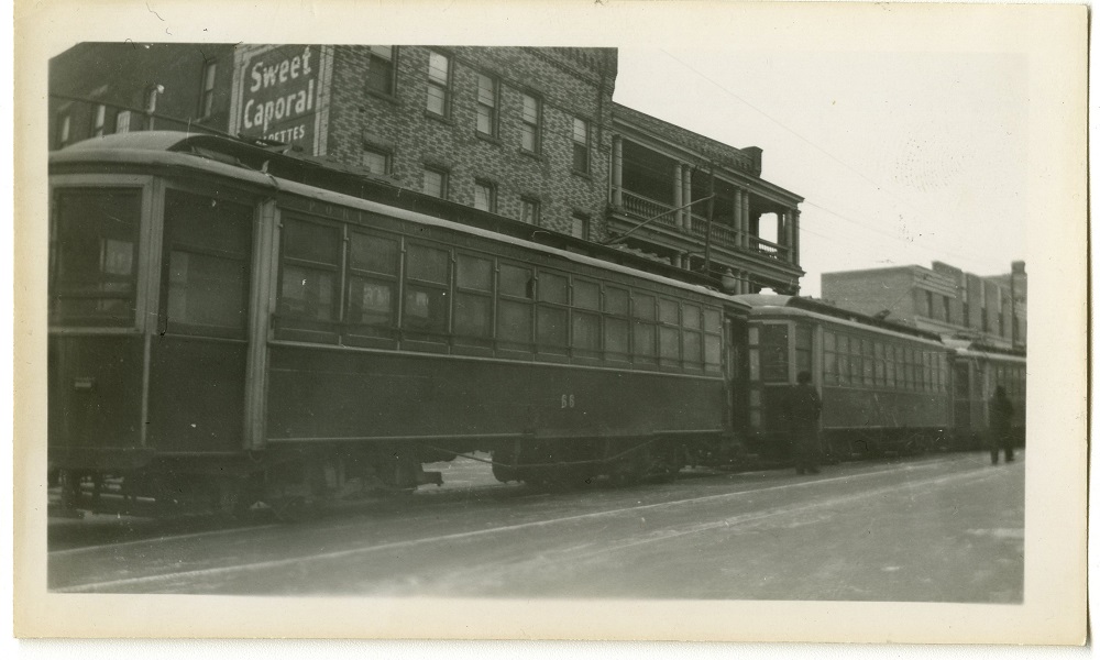 a streetcar travelling down a street