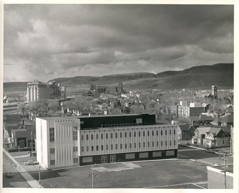 An aerial photo of a large building taken as the plane approached from the front