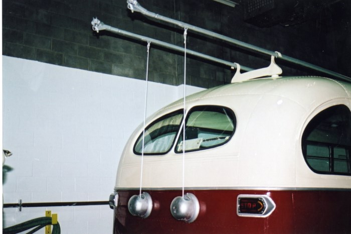the back end of a trolley bus with the wig wags attached 