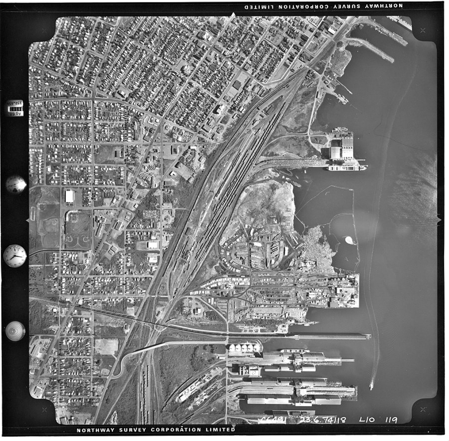 A black and white aerial photo of the city's waterfront
