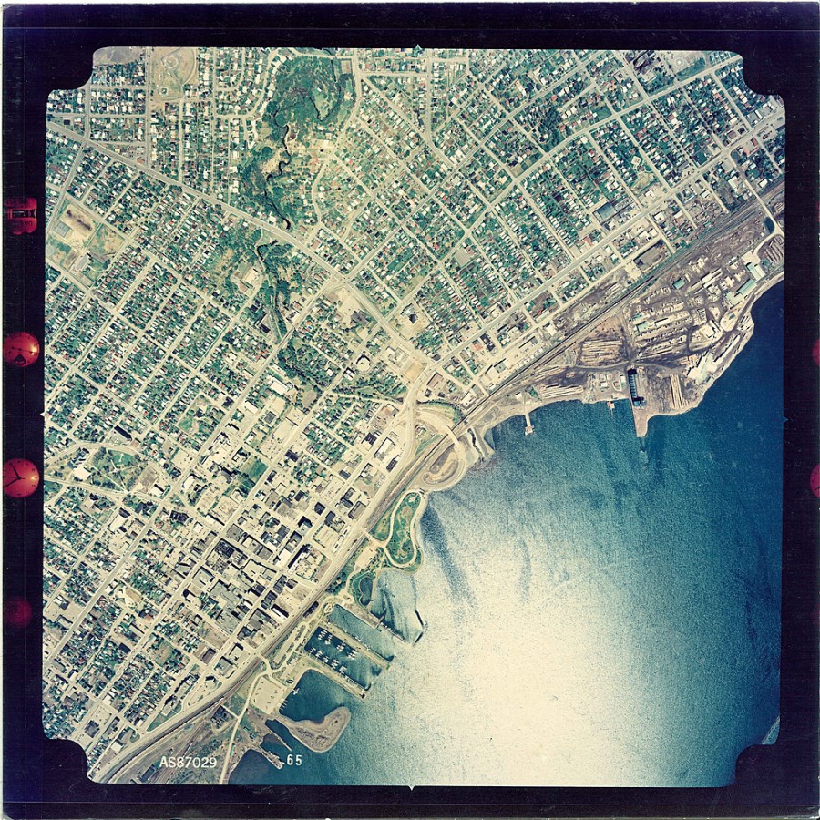 A coloured aerial photograph of the waterfront and surrounding area