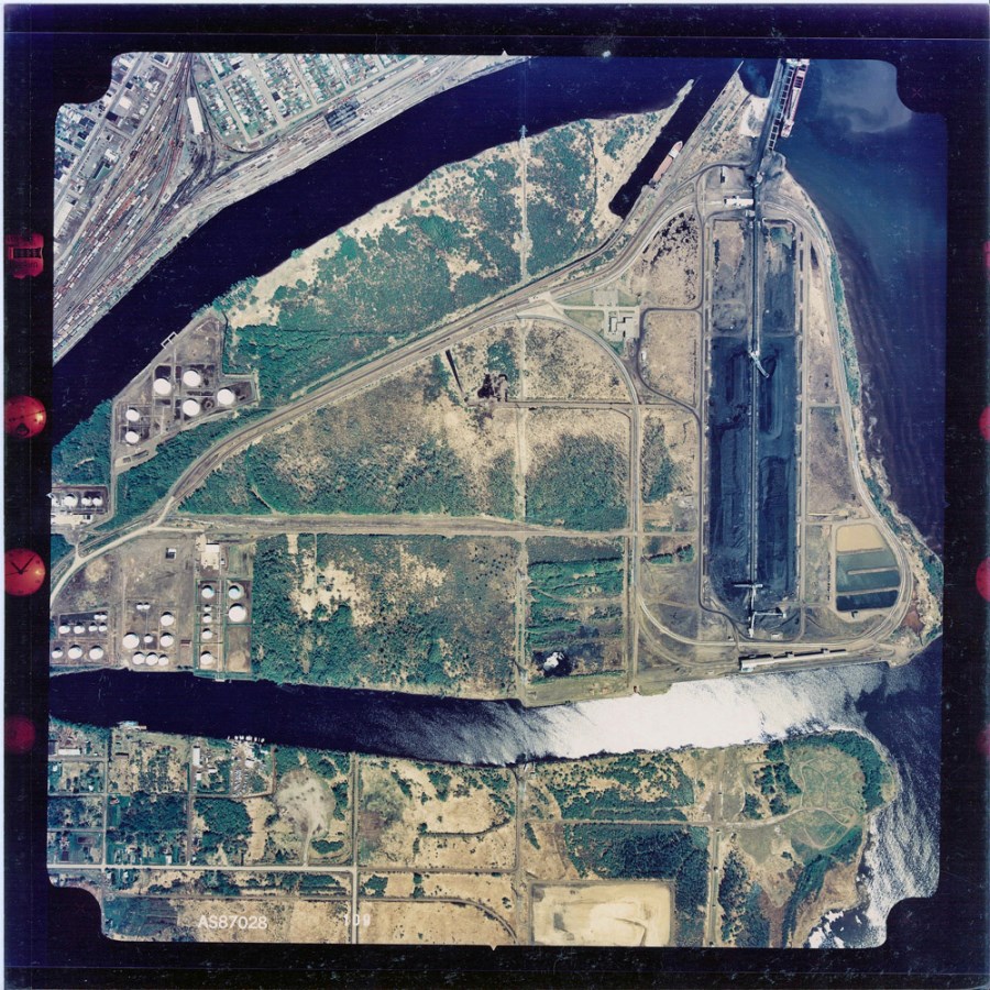 A coloured aerial photograph of the waterfront and surrounding area