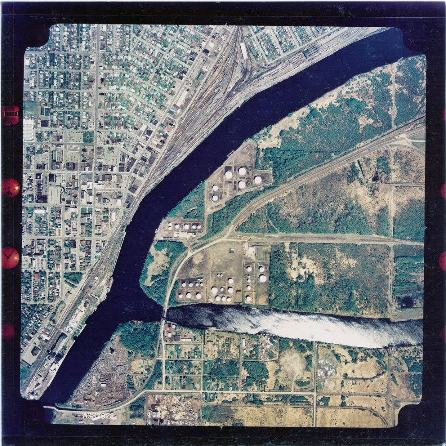 A coloured aerial photograph of the waterfront and surrounding area