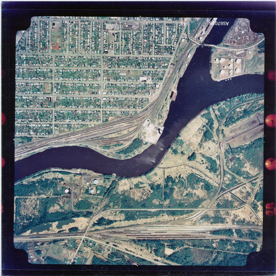 A coloured aerial photograph of the waterfront and surrounding area
