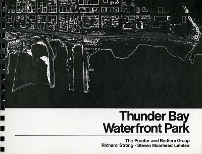 The front cover of a booklet depicts an aerial view of the waterfront