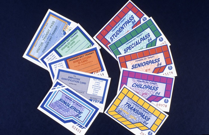 Two rows of fanned out tickets detail different fare prices for different ages