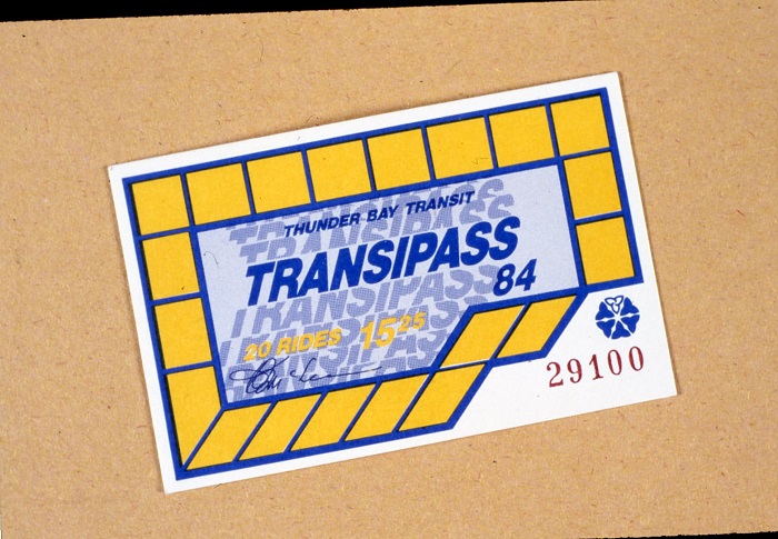 A blue and yellow transit pass labeled "transipass'