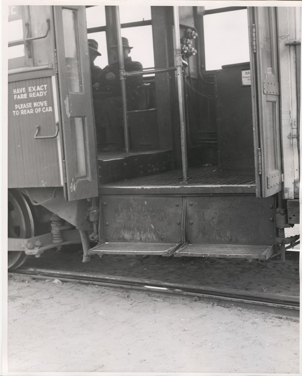Open doors into street railways car