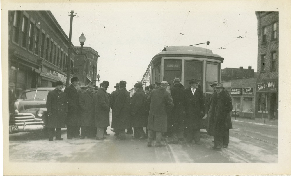 shows group of operators gathering to take a photo.
