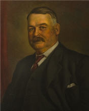 Mayor George Graham sitting for a painting wearing a suit