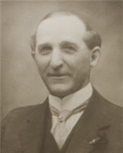 Mayor L. L. Peltier wearing a black suit in a black and white photo