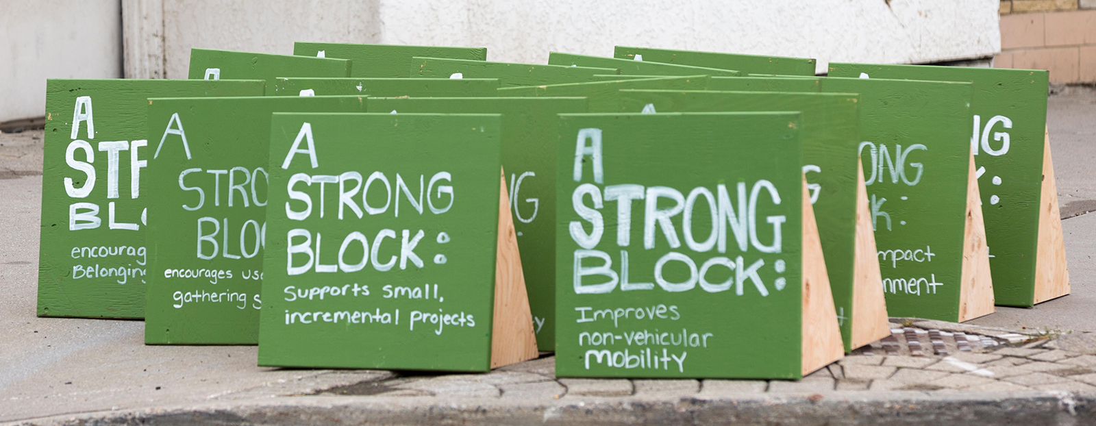 blocks of wood that read "strong block"