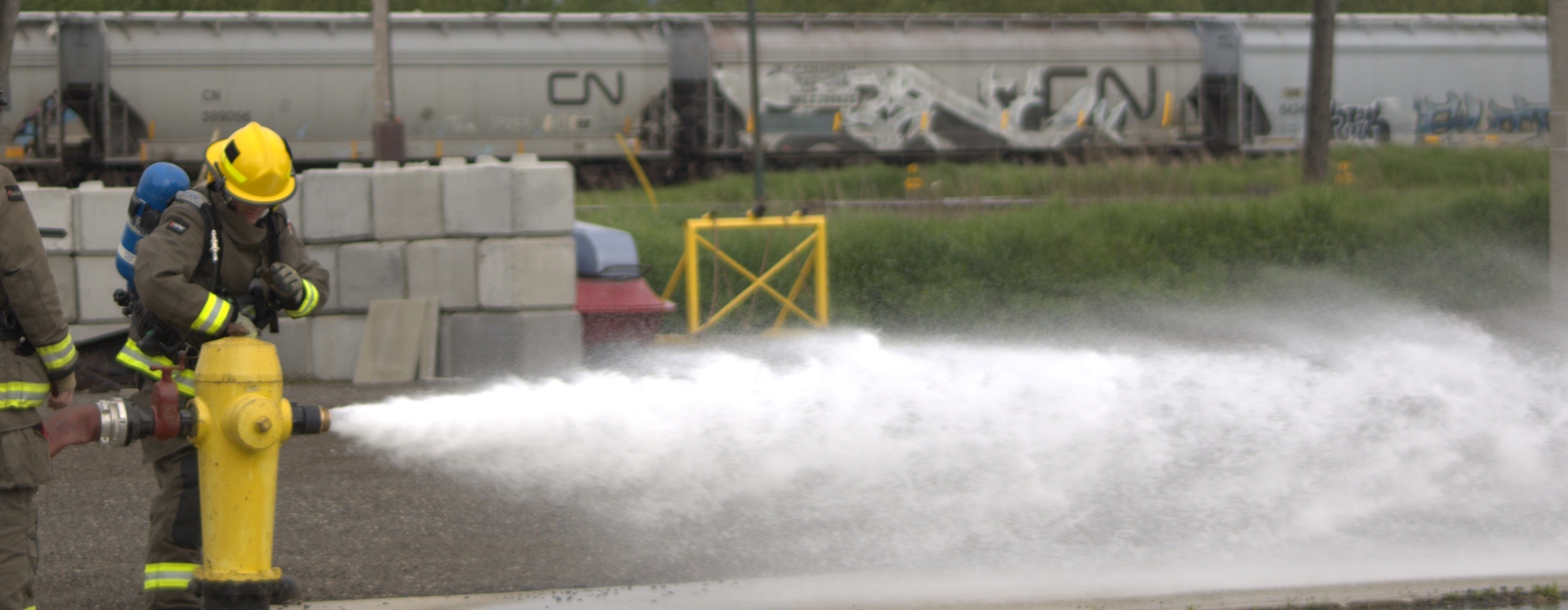 Firefighter with a fire hydrant