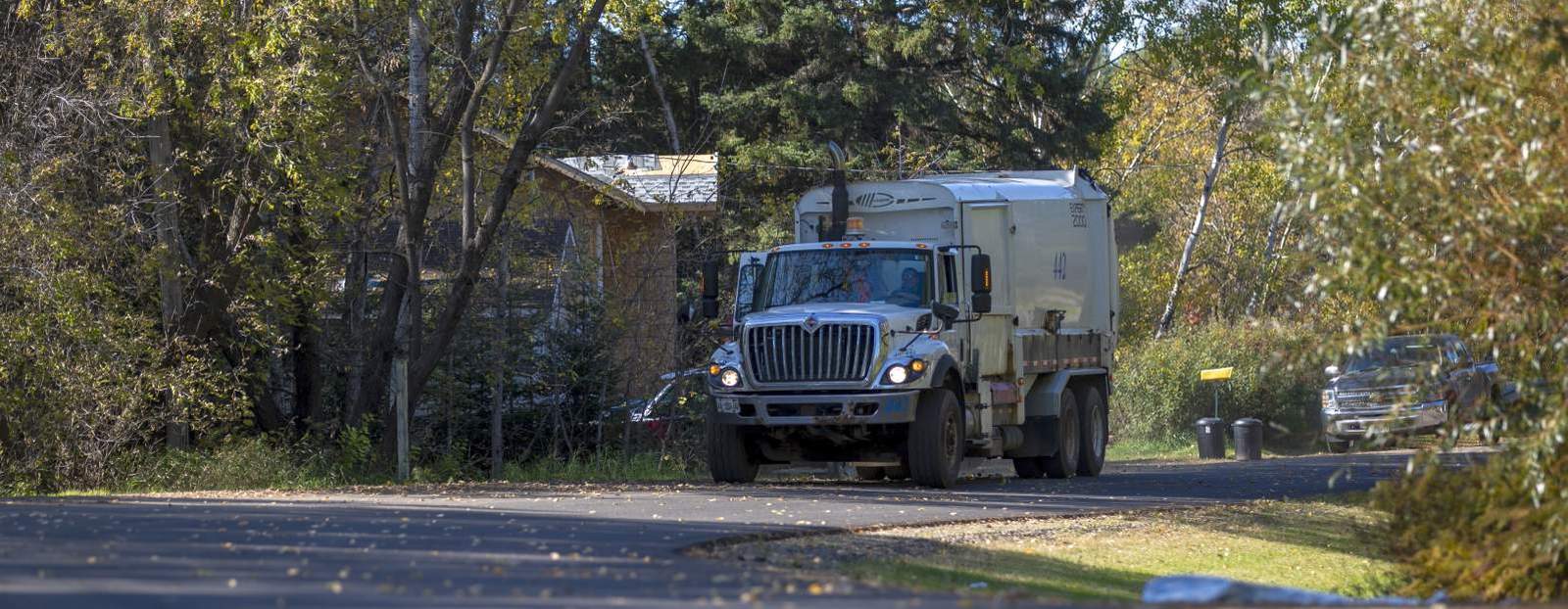 garbage truck on city street
