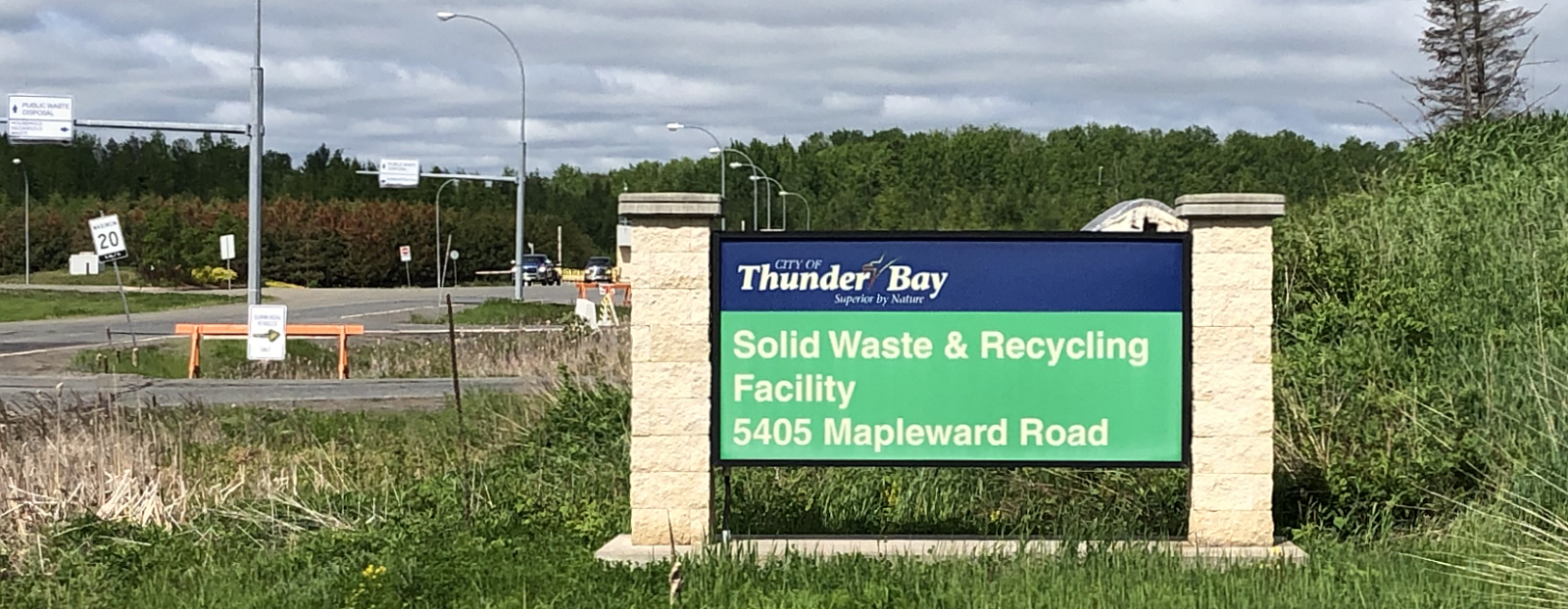 landfill entrance with sign