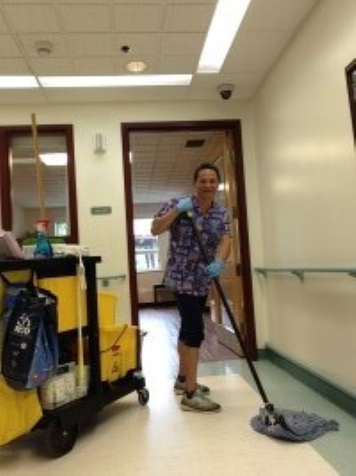 person mopping floor