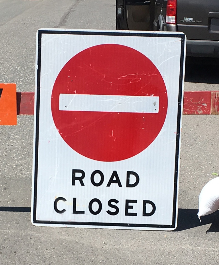 A road closure sign.