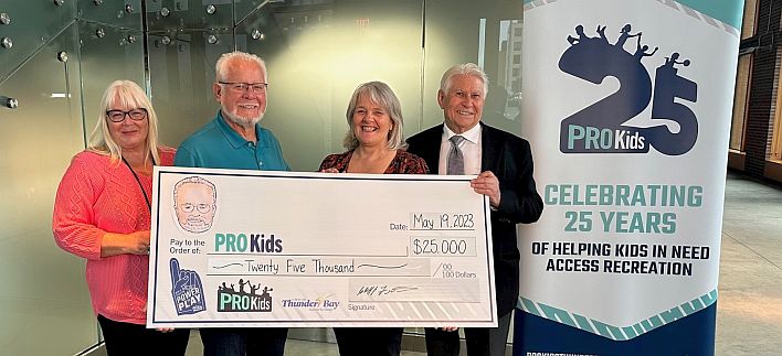 Laura Daniele and Mayor Boshcoff accept ceremonial cheque from Cliff Friesen for PRO Kids